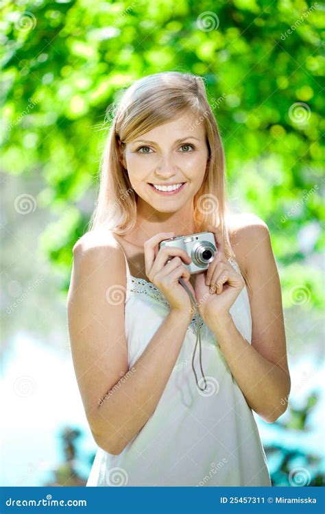 Beautiful Smiling Woman With A Camera Outdoors Stock Image Image Of