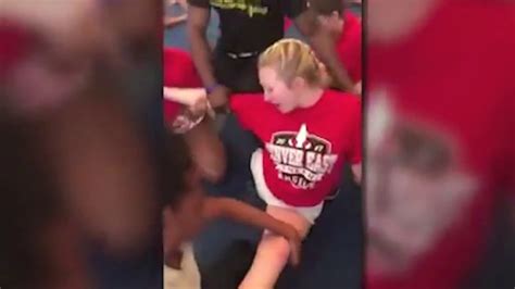 shocking video shows us high school cheerleader forced to do the splits