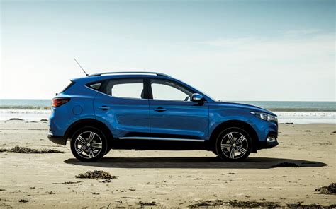 comparison mg zs exclusive   mitsubishi eclipse cross sel  suv drive