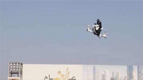 dubai police unveil  flying drone motorbike video