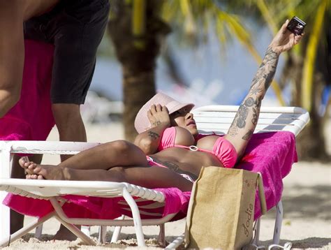 Busty Jodie Marsh Wearing A Skimpy Pink Bikini On A Beach In Barbados