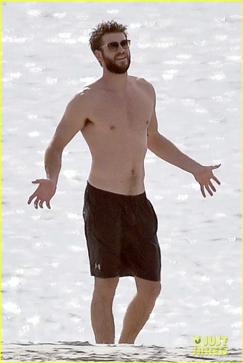 liam hemsworth goes shirtless on the beach where he met miley cyrus photo 3977380 liam