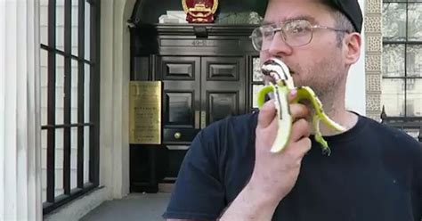 man eats banana erotically in protest against china s ban on scoffing