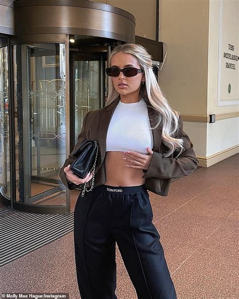 molly mae hague puts on a stylish display in ab baring white crop top
