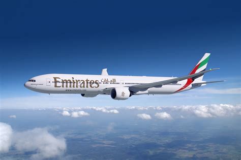 cbbf emirates boeing  er flight clouds jet steele luxury travel