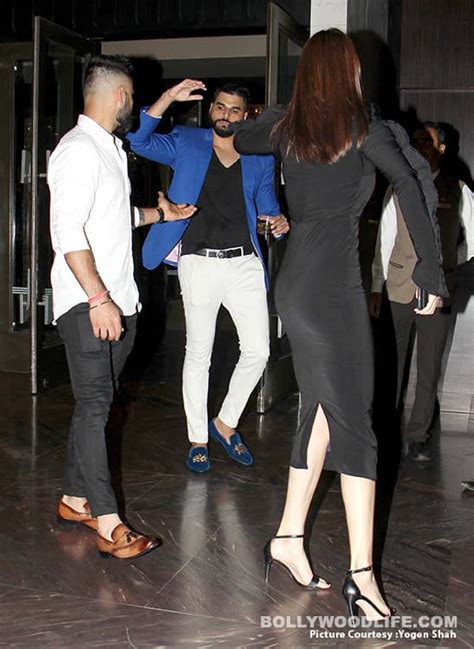 no smile for the paparazzi what were anushka and virat
