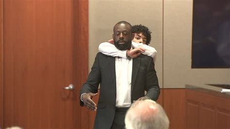 witness demonstrates choke hold during trial over deadly