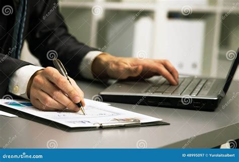 close   male hands  paperwork stock image image  closeup hand