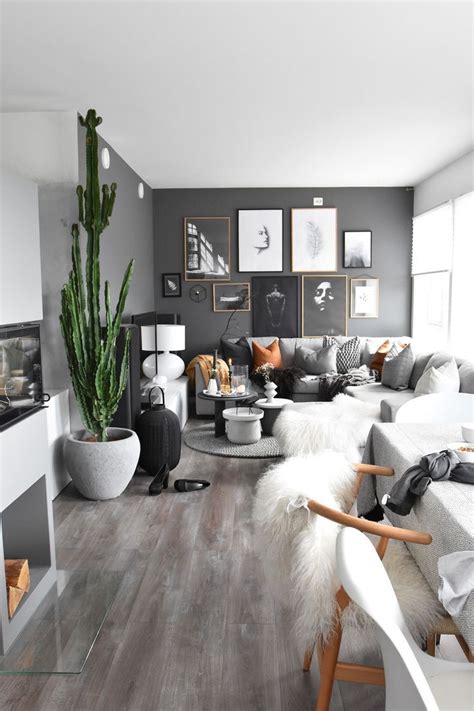 dark grey black wall living room idea  indoor plants  amazing wall art black walls