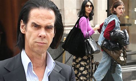 Nick Cave Makes A Rare Outing With Wife And Son In London