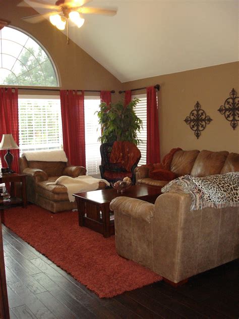 warm family room reds  browns brown living room decor living