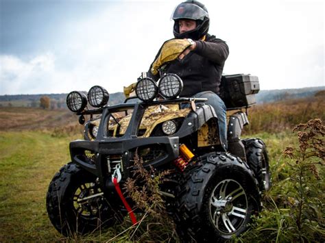 daymaks latest  electric atv tackles  terrain     miles