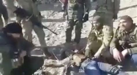 videos of syrian militia abusing kurdish fighter s corpse stir outrage
