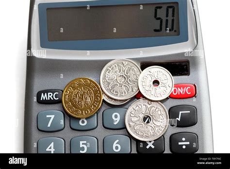 mixed danish coins   calculator accounting concept  krone   official currency