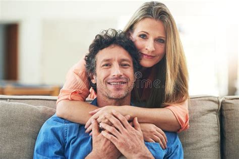 The Heart Of A Home Is Love Portrait Of A Happy Mature Couple Having A