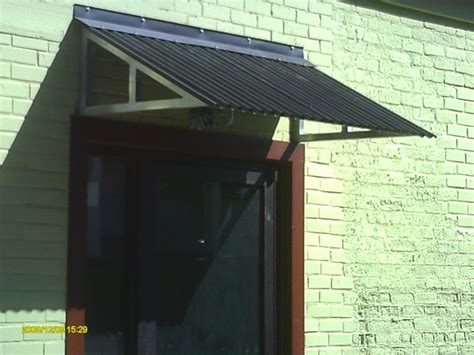 pin  jennifer wohl  studio awning metal awnings  windows metal awning metal door awning