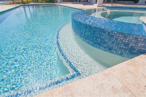 custom pool spillway spa  pompano beach tropical swimming pool