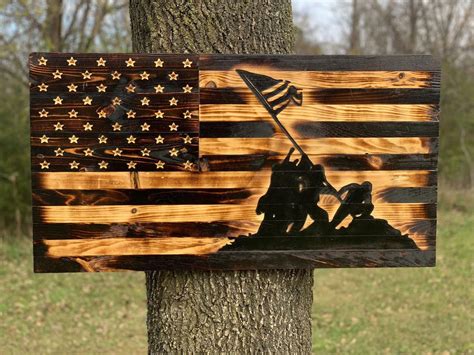 hand  rustic wooden flag depicting     iconic