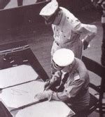 photo admiral conrad   helfrich signing  japanese surrender document  behalf