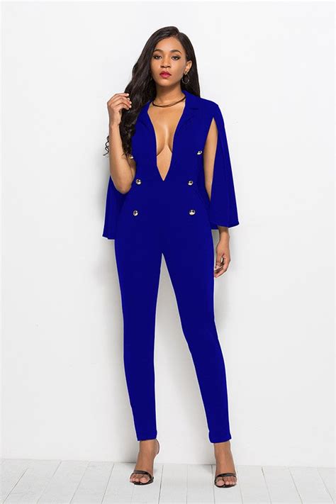royal blue jumpsuit with deep v neck and cape style