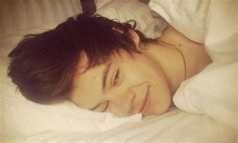 Harry Styles Shares Intimate Snap As He Poses Between The Sheets But