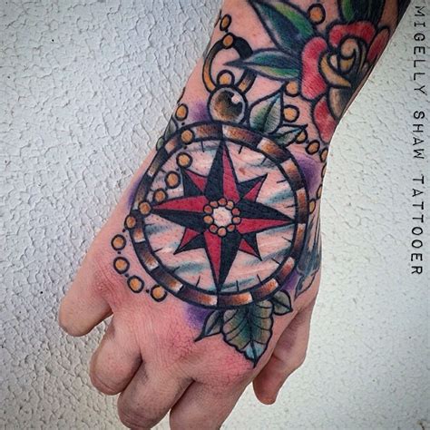 Traditional Compass Hand Tattoo On Helenm3367 Neck