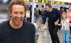Chris Martin Can Barely Contain His Excitement As He Catches Flight