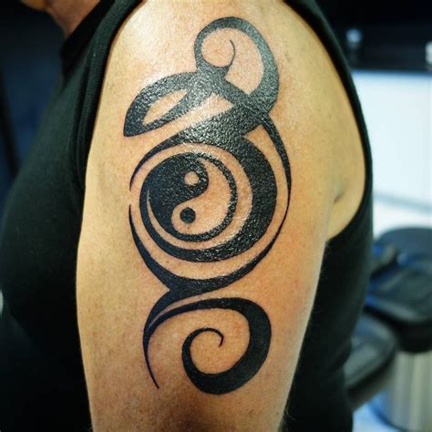 yin  tattoo designs inseparable contradictory opposites