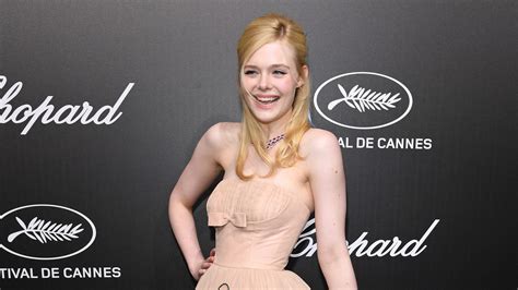 elle fanning says she fainted at cannes because of her vintage gown