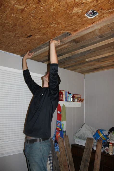 remodelaholic rustic pallet wood ceiling tutorial