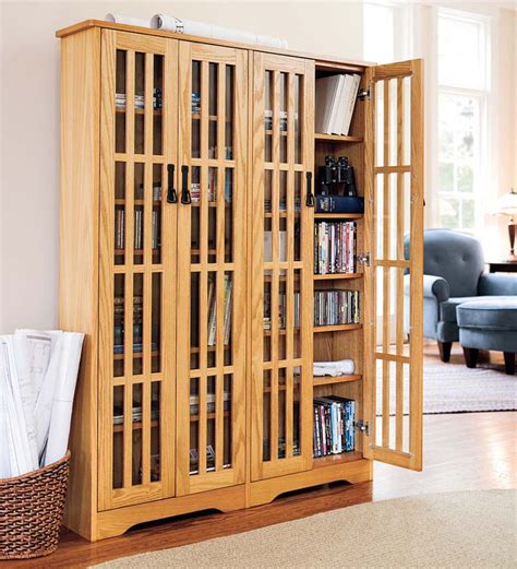 large arts  crafts style glass front media storage cabinet