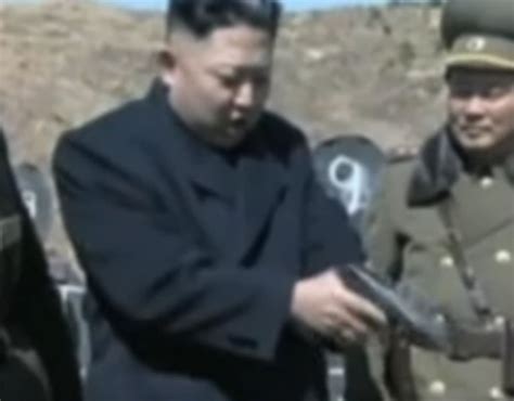 kim jong un holds his gun the world s dictators as you