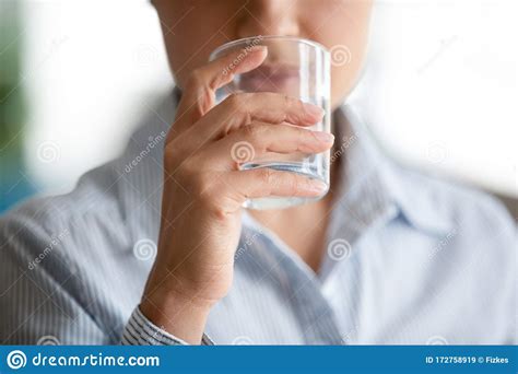 Thirsty Female Enjoy Drink Clear Mineral Water Stock Image
