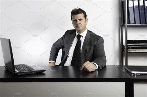 businessman sitting  desk high quality business images creative