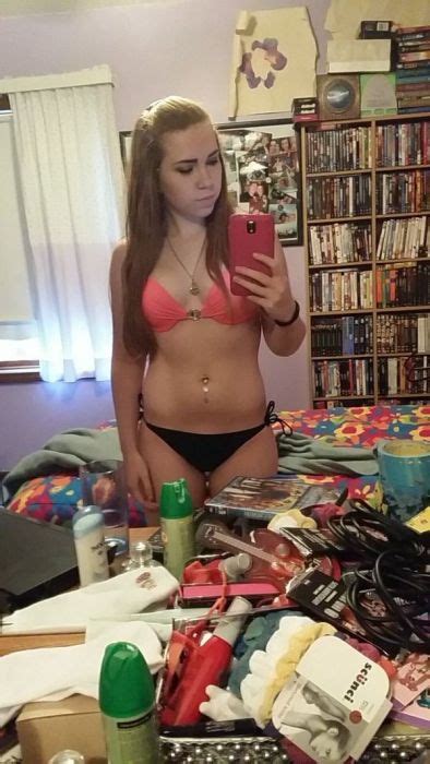 hot girls pose for sexy selfies in cluttered rooms 25 pics