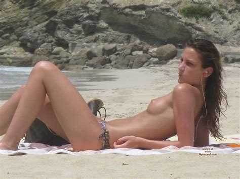 topless slender tanner on beach may 2010 voyeur web hall of fame