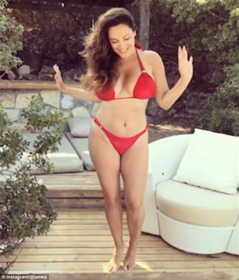 Kelly Brook Showcases Ample Assets In Red String Bikini Daily Mail Online