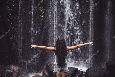 beautiful woman  waterfall stock photo  olegbreslavtsev
