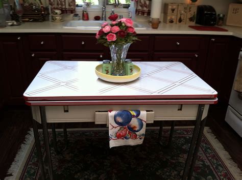 country inspired vintage kitchen  enamel table