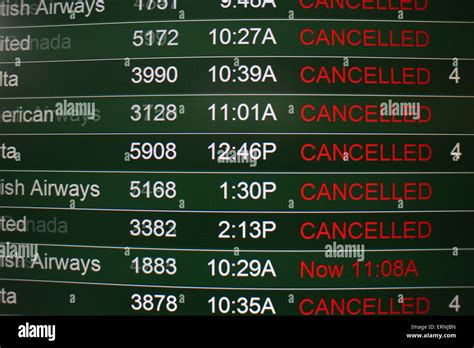 canceled flights  airport flight status board cincinnati stock photo