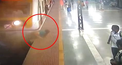 Shocking Woman Gets Hit By Train After Trying To Climb Platform From