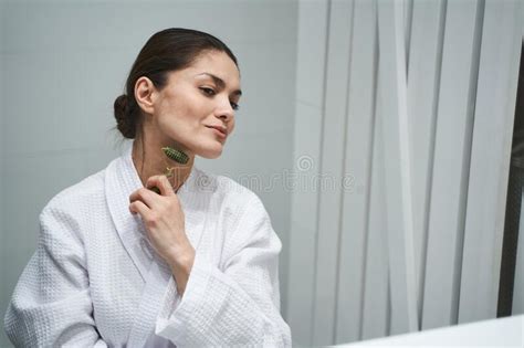 Focused Lady Giving Herself A Facial Massage Stock Image Image Of