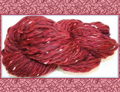 items similar  handspun bulky red variegated yarn  merino wool plied  novelty yarn