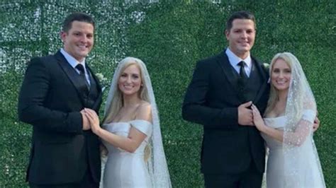 identical twin sisters marry identical twin brothers at twins day festival