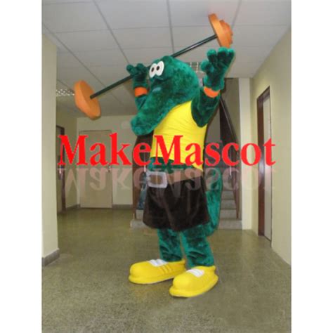 green crocodile mascot with a yellow t shirt mascot costume in 2020