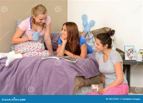 Three Teenage Girls Talking At Pajama Party Royalty Free Stock