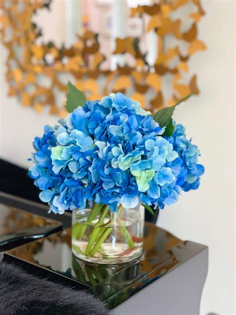 real touch blue hydrangea arrangement flovery