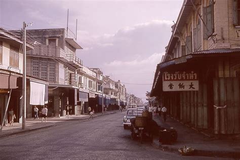 landscape photograph   urban street scene including store fronts