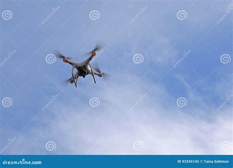dji phantom quadrocopter  action  sky editorial image image  aerial clouds