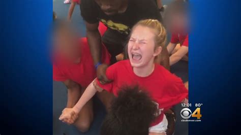videos show school cheerleaders forced into splits youtube